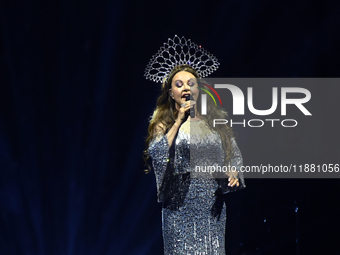 British singer Sarah Brightman performs on stage during the A Christmas Symphony Holiday Tour at Mexico City Arena in Mexico City, Mexico, o...