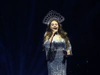 British singer Sarah Brightman performs on stage during the A Christmas Symphony Holiday Tour at Mexico City Arena in Mexico City, Mexico, o...