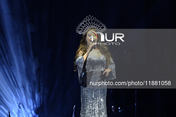 British singer Sarah Brightman performs on stage during the A Christmas Symphony Holiday Tour at Mexico City Arena in Mexico City, Mexico, o...