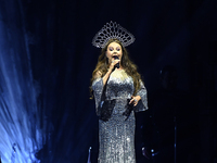 British singer Sarah Brightman performs on stage during the A Christmas Symphony Holiday Tour at Mexico City Arena in Mexico City, Mexico, o...