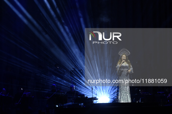 British singer Sarah Brightman performs on stage during the A Christmas Symphony Holiday Tour at Mexico City Arena in Mexico City, Mexico, o...