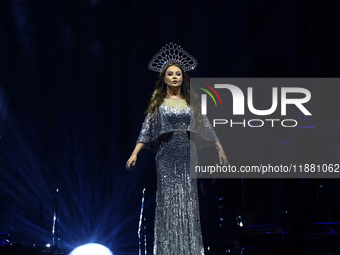 British singer Sarah Brightman performs on stage during the A Christmas Symphony Holiday Tour at Mexico City Arena in Mexico City, Mexico, o...