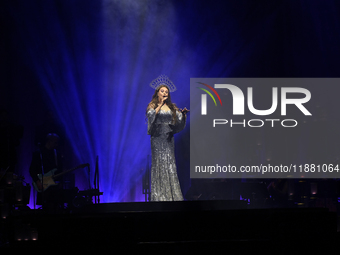 British singer Sarah Brightman performs on stage during the A Christmas Symphony Holiday Tour at Mexico City Arena in Mexico City, Mexico, o...