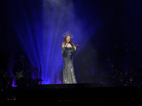 British singer Sarah Brightman performs on stage during the A Christmas Symphony Holiday Tour at Mexico City Arena in Mexico City, Mexico, o...