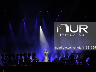 British singer Sarah Brightman performs on stage during the A Christmas Symphony Holiday Tour at Mexico City Arena in Mexico City, Mexico, o...