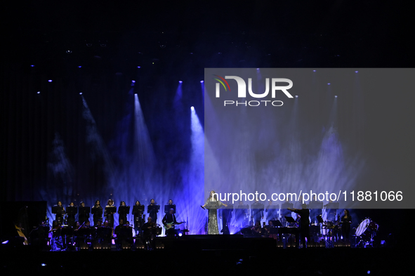 British singer Sarah Brightman performs on stage during the A Christmas Symphony Holiday Tour at Mexico City Arena in Mexico City, Mexico, o...