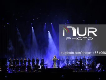 British singer Sarah Brightman performs on stage during the A Christmas Symphony Holiday Tour at Mexico City Arena in Mexico City, Mexico, o...