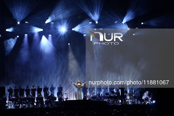 British singer Sarah Brightman performs on stage during the A Christmas Symphony Holiday Tour at Mexico City Arena in Mexico City, Mexico, o...