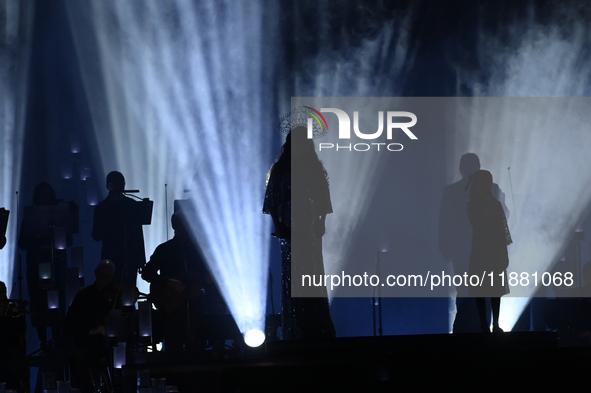 British singer Sarah Brightman performs on stage during the A Christmas Symphony Holiday Tour at Mexico City Arena in Mexico City, Mexico, o...