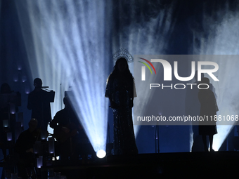 British singer Sarah Brightman performs on stage during the A Christmas Symphony Holiday Tour at Mexico City Arena in Mexico City, Mexico, o...