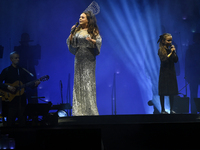 British singer Sarah Brightman and Sofia Escoto perform on stage during the A Christmas Symphony Holiday Tour at Mexico City Arena in Mexico...