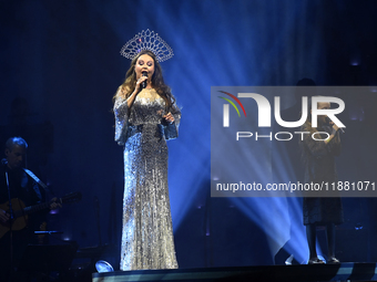 British singer Sarah Brightman and Sofia Escoto perform on stage during the A Christmas Symphony Holiday Tour at Mexico City Arena in Mexico...