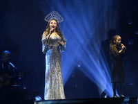 British singer Sarah Brightman and Sofia Escoto perform on stage during the A Christmas Symphony Holiday Tour at Mexico City Arena in Mexico...