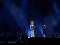 British singer Sarah Brightman and Sofia Escoto perform on stage during the A Christmas Symphony Holiday Tour at Mexico City Arena in Mexico...