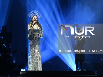 British singer Sarah Brightman and Sofia Escoto perform on stage during the A Christmas Symphony Holiday Tour at Mexico City Arena in Mexico...