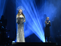 British singer Sarah Brightman and Sofia Escoto perform on stage during the A Christmas Symphony Holiday Tour at Mexico City Arena in Mexico...