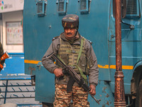 An Indian security personnel stands guard along a road in Srinagar, Jammu and Kashmir, on December 19, 2024. Indian security forces kill fiv...