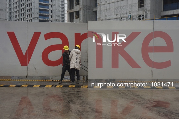 A newly built Vanke commercial housing complex is seen in Hangzhou, Zhejiang province, China, on December 19, 2024. 