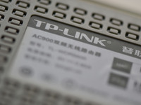 The logo of TP-Link appears on the products of router manufacturer TP-Link in Fuyang, China, on December 19, 2024. (