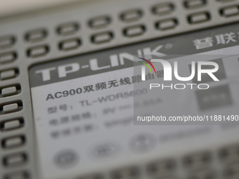 The logo of TP-Link appears on the products of router manufacturer TP-Link in Fuyang, China, on December 19, 2024. (