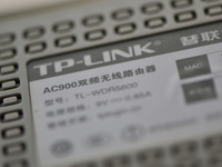 The logo of TP-Link appears on the products of router manufacturer TP-Link in Fuyang, China, on December 19, 2024. (