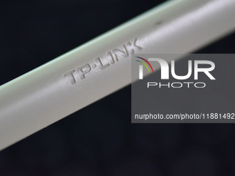 The logo of TP-Link appears on the products of router manufacturer TP-Link in Fuyang, China, on December 19, 2024. (