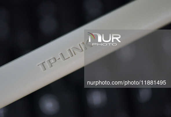 The logo of TP-Link appears on the products of router manufacturer TP-Link in Fuyang, China, on December 19, 2024. 