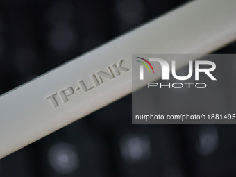 The logo of TP-Link appears on the products of router manufacturer TP-Link in Fuyang, China, on December 19, 2024. (