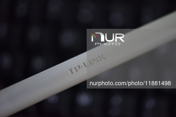 The logo of TP-Link appears on the products of router manufacturer TP-Link in Fuyang, China, on December 19, 2024. 