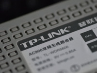 The logo of TP-Link appears on the products of router manufacturer TP-Link in Fuyang, China, on December 19, 2024. (