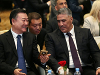 Algerian Minister of Housing Mohamed Tarek Belaribi (R) and Chinese Minister of Housing and Urban and Rural Development Ni Hong (L) attend t...