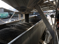 A truck is filled with sunflower seeds at a grain elevator in Chernihiv region, northern Ukraine, on December 18, 2024. (