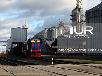 A locomotive is on the premises of a grain elevator in Chernihiv region, Ukraine, on December 18, 2024. NO USE RUSSIA. NO USE BELARUS. (