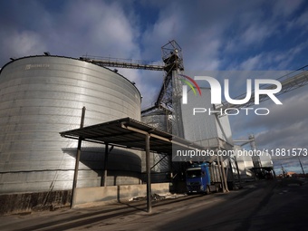 A truck is filled with grain at a grain elevator in Chernihiv region, northern Ukraine, on December 18, 2024. NO USE RUSSIA. NO USE BELARUS....