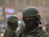 An Indian security personnel stands guard along a road in Srinagar, Jammu and Kashmir, on December 19, 2024. Indian security forces kill fiv...