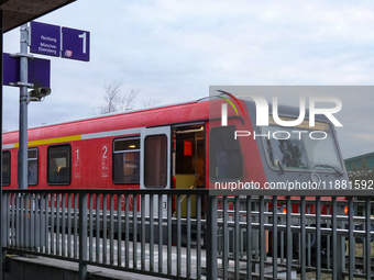 A Sudostbayernbahn train is at Wasserburg am Inn station in Bavaria, Germany, on December 15, 2024. (