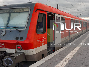 A Sudostbayernbahn train is at Wasserburg am Inn station in Bavaria, Germany, on December 15, 2024. (