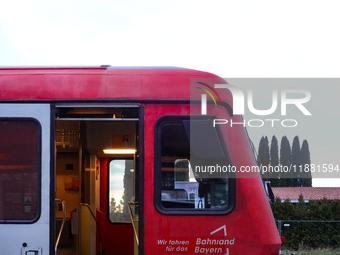 A Sudostbayernbahn train is at Wasserburg am Inn station in Bavaria, Germany, on December 15, 2024. (