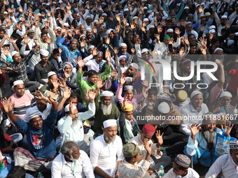 People take part in a protest meeting in Kolkata, India, on December 19, 2024, demanding the withdrawal of the Central Government's WAQF Ame...