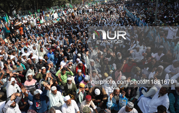 People take part in a protest meeting in Kolkata, India, on December 19, 2024, demanding the withdrawal of the Central Government's WAQF Ame...