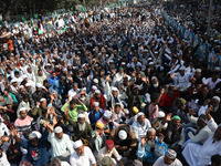 People take part in a protest meeting in Kolkata, India, on December 19, 2024, demanding the withdrawal of the Central Government's WAQF Ame...