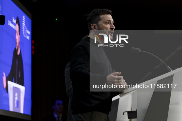 President of Ukraine Volodymyr Zelenskyy addresses a press conference during his visit at the European Council Summit, the EU leaders meetin...