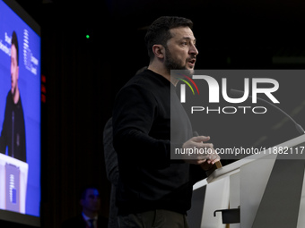 President of Ukraine Volodymyr Zelenskyy addresses a press conference during his visit at the European Council Summit, the EU leaders meetin...