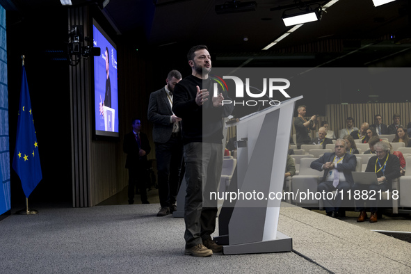 President of Ukraine Volodymyr Zelenskyy addresses a press conference during his visit at the European Council Summit, the EU leaders meetin...