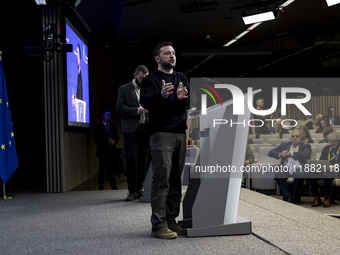 President of Ukraine Volodymyr Zelenskyy addresses a press conference during his visit at the European Council Summit, the EU leaders meetin...