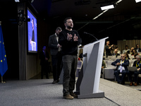 President of Ukraine Volodymyr Zelenskyy addresses a press conference during his visit at the European Council Summit, the EU leaders meetin...