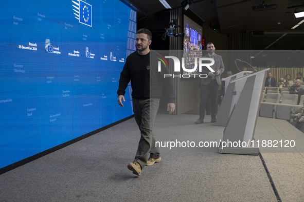 President of Ukraine Volodymyr Zelenskyy departs from a press conference during his visit in Brussels and the European Council Summit, the E...