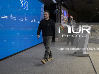 President of Ukraine Volodymyr Zelenskyy departs from a press conference during his visit in Brussels and the European Council Summit, the E...