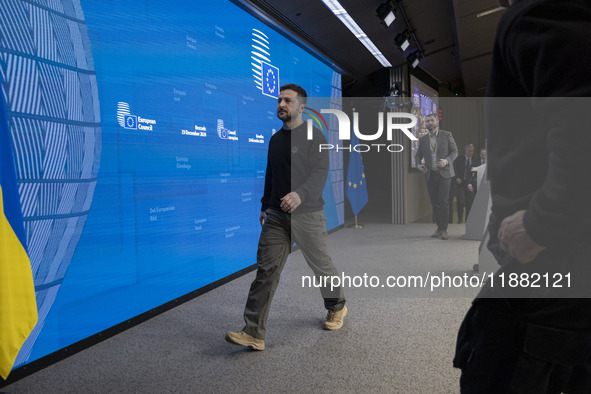 President of Ukraine Volodymyr Zelenskyy departs from a press conference during his visit in Brussels and the European Council Summit, the E...