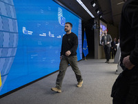 President of Ukraine Volodymyr Zelenskyy departs from a press conference during his visit in Brussels and the European Council Summit, the E...